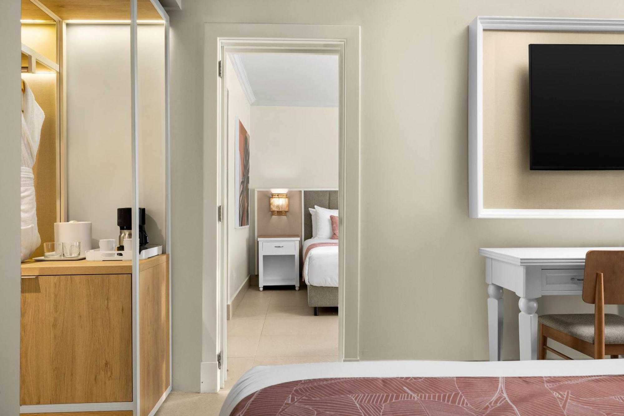 Family Junior Suite One King Bed Two Queen Beds Tropical View