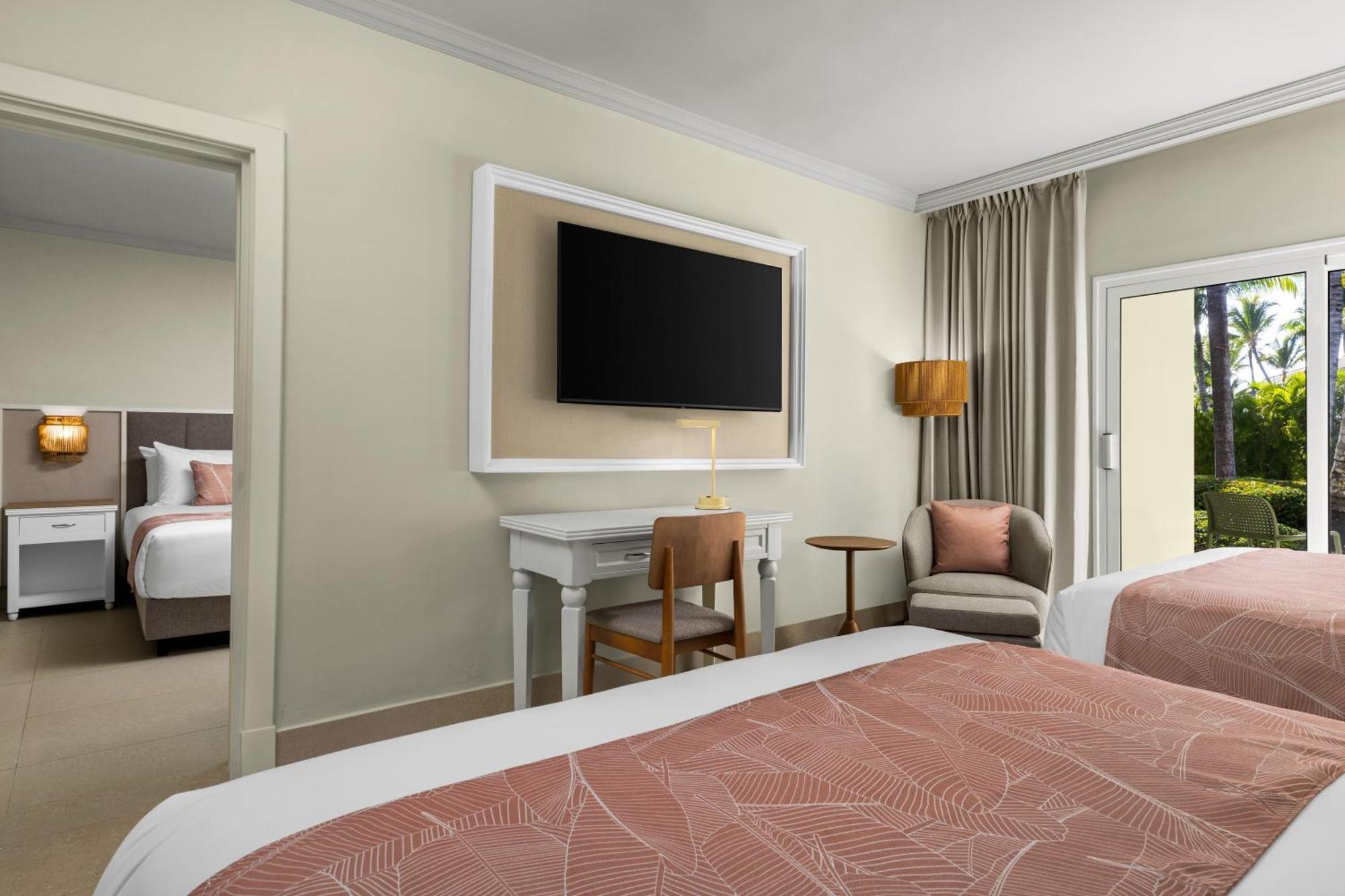 Family Junior Suite One King Bed Two Queen Beds Tropical View